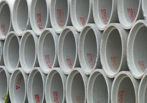 Stacked precast concrete pipes.